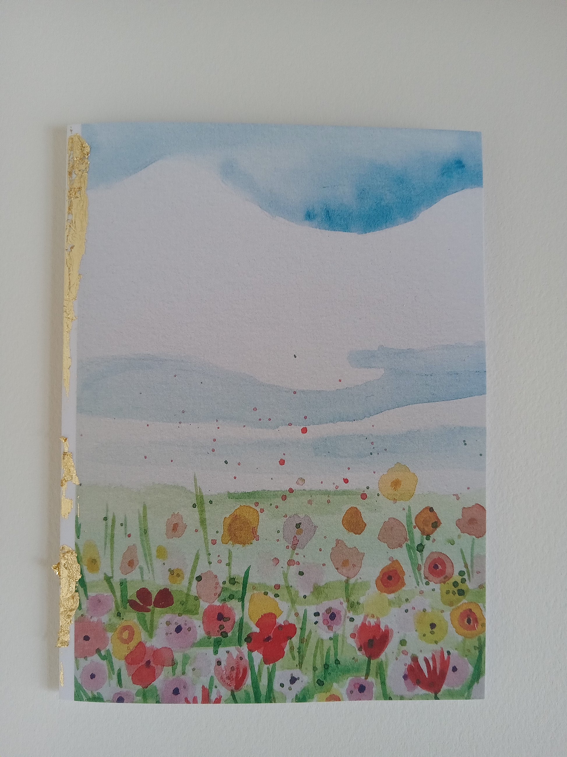 greeting card watercolor design embellished with gold leaf, on a white background