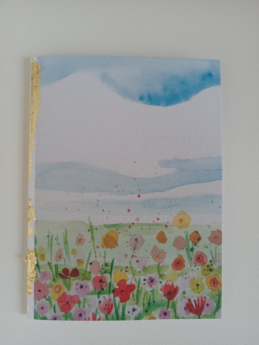 greeting card watercolor design embellished with gold leaf, on a white background