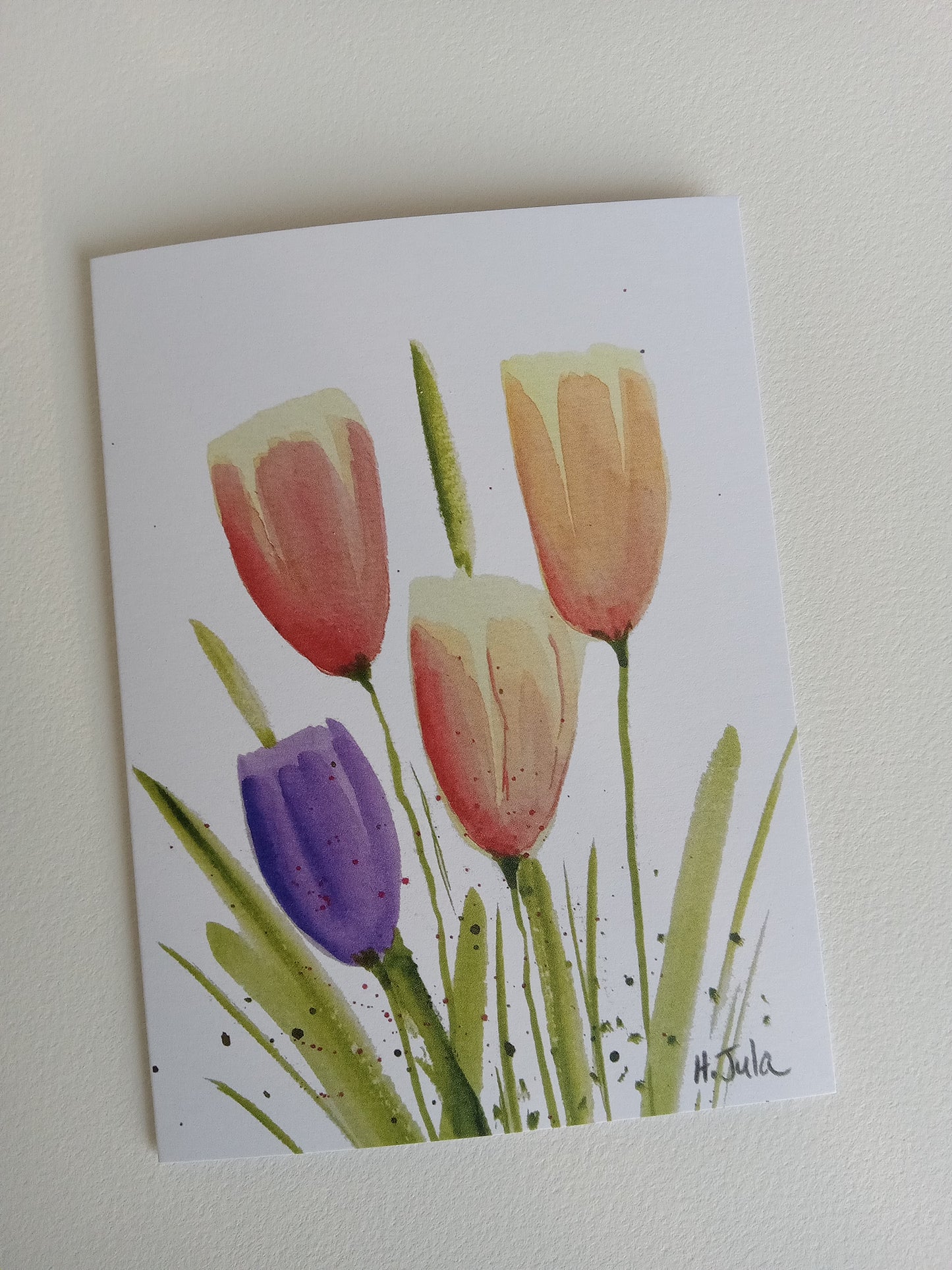 Greeting card with tulip illustrations on a plain white background